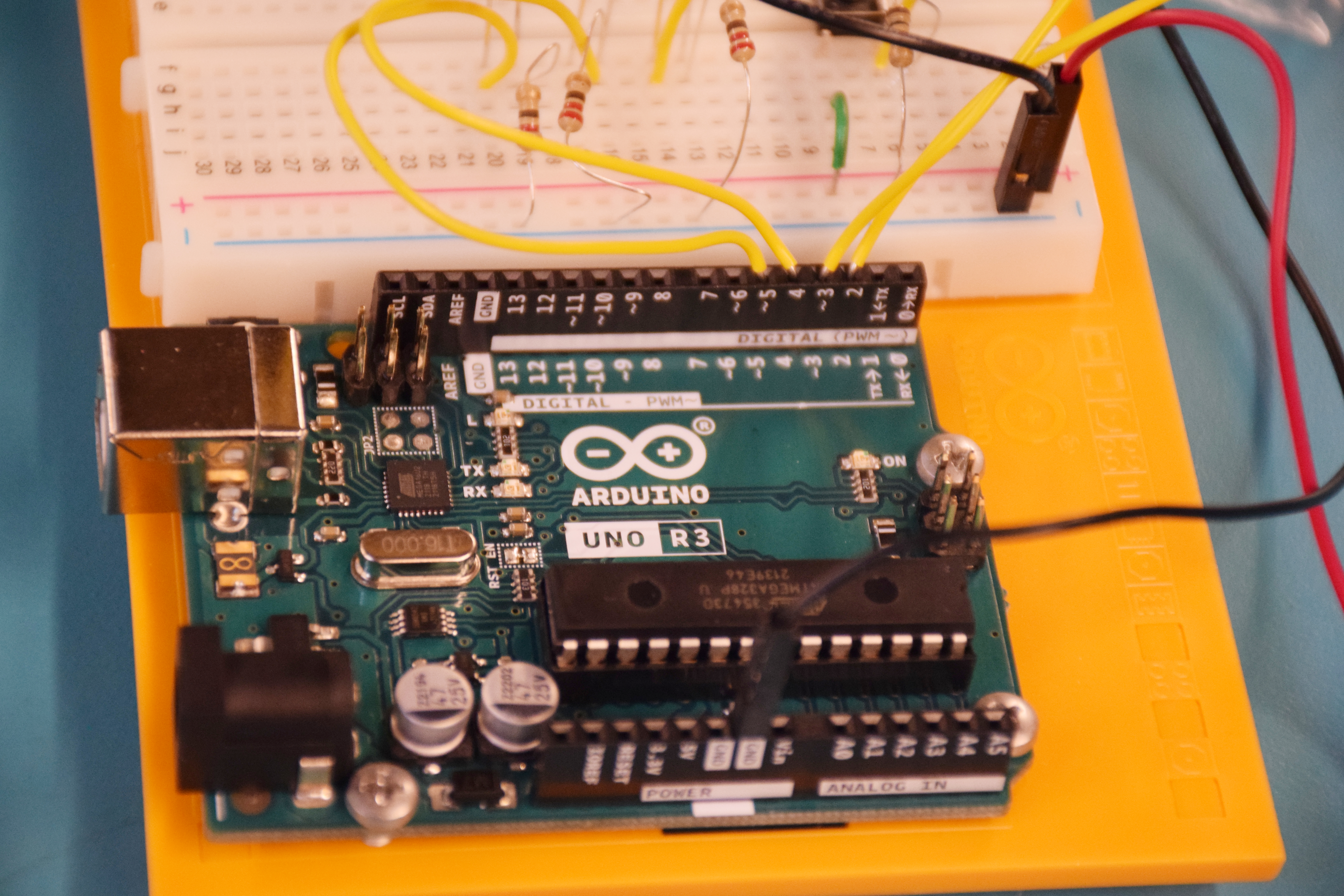 Close up of Arduino Connected to Breadboard