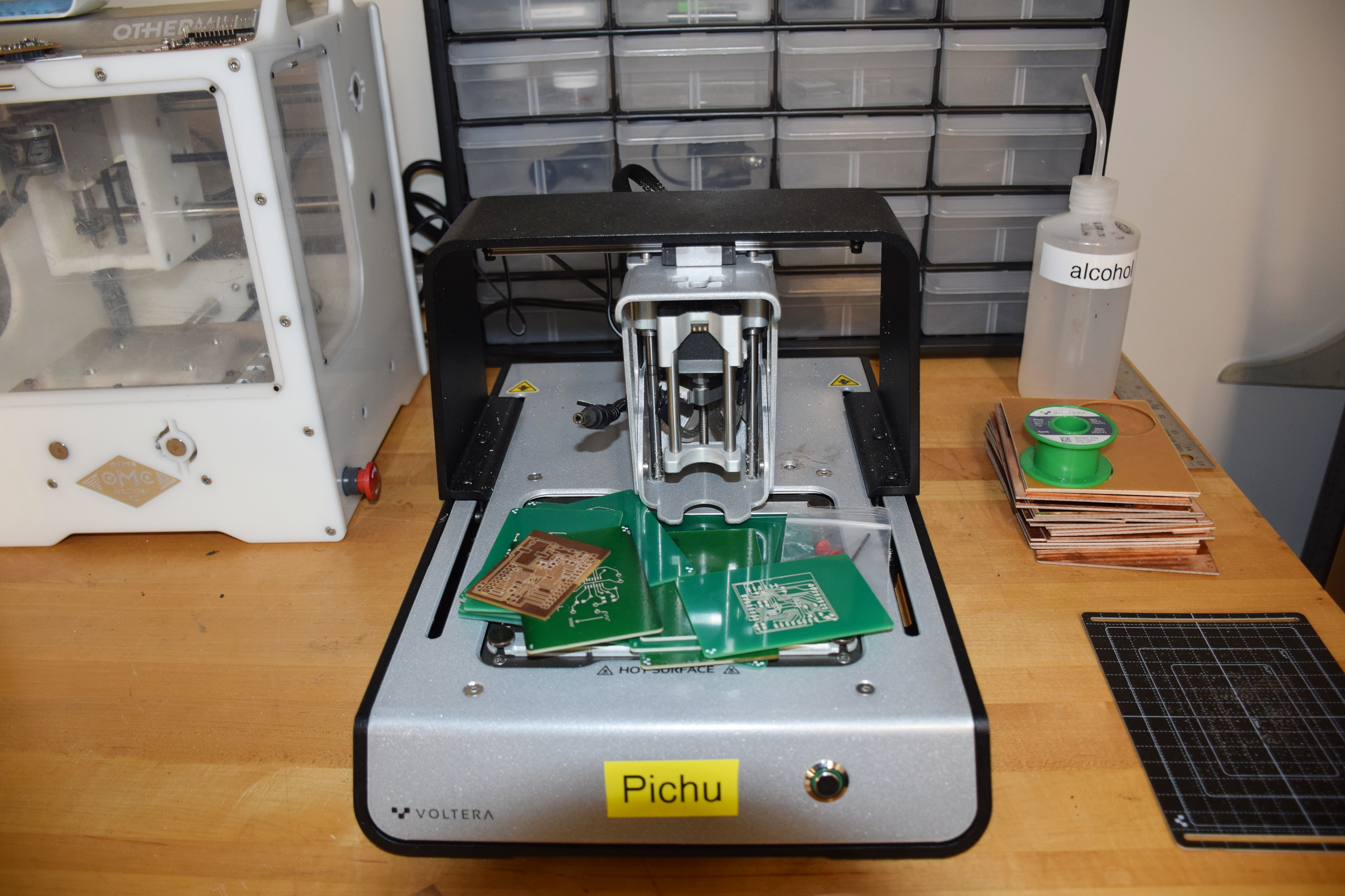 Front View of PCB Printer with Printed Circuits on it