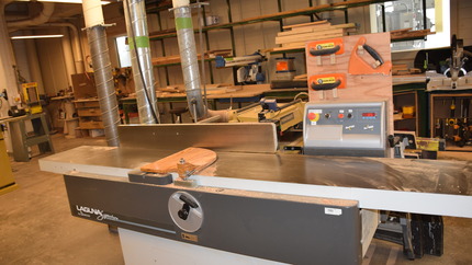 Jointer seen from an angle on a metal stand